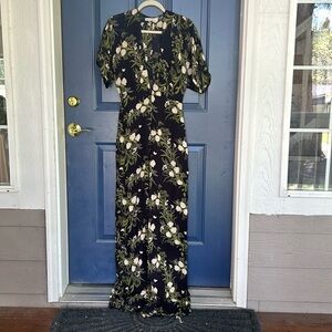 Adorable Reformation jumpsuit — black with green floral pattern